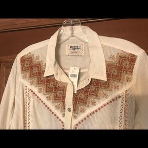 Anthropologie Holding Horses